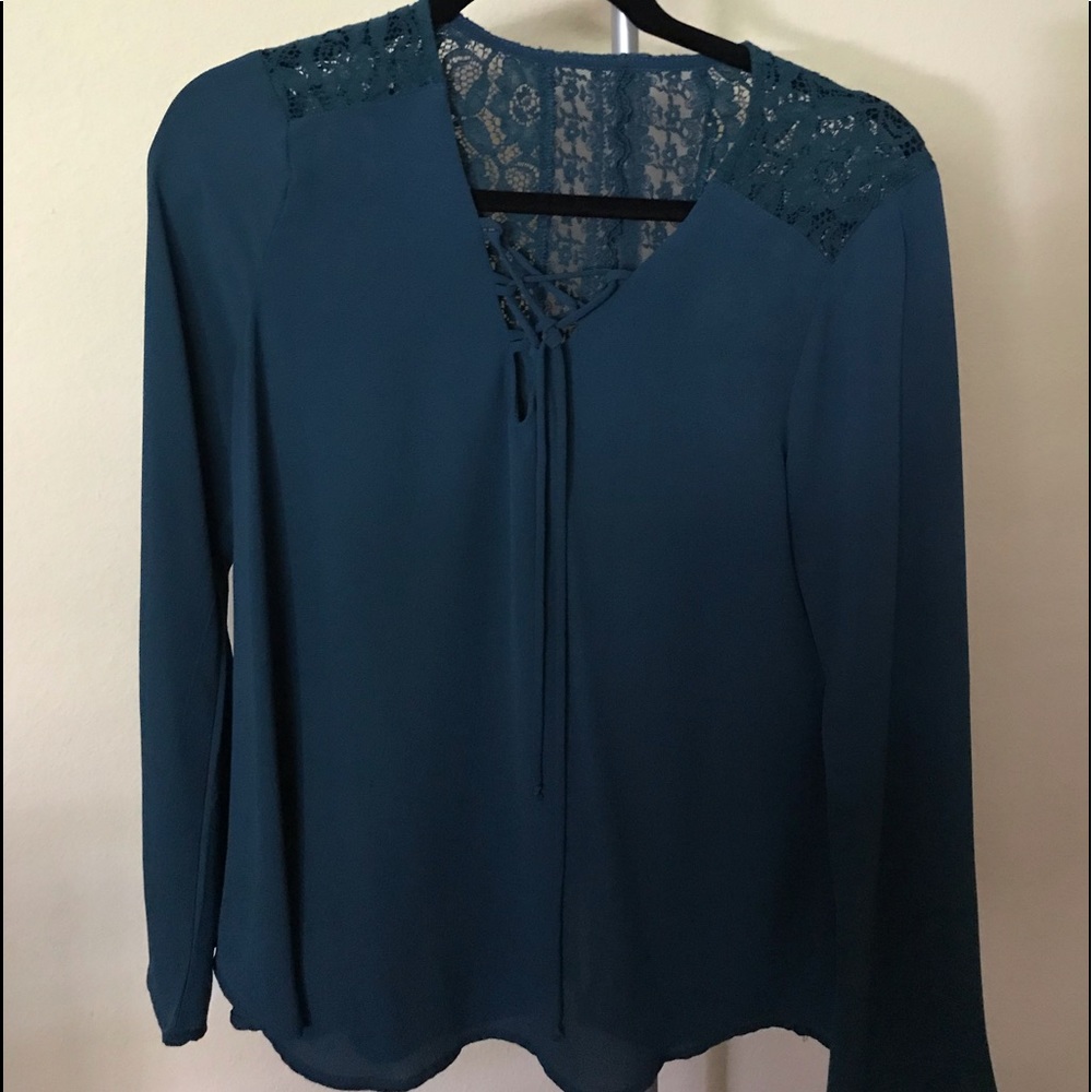 Bluish-green blouse front and back shown